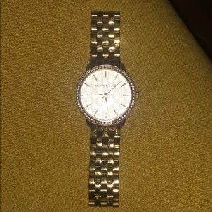 Gold MK watch